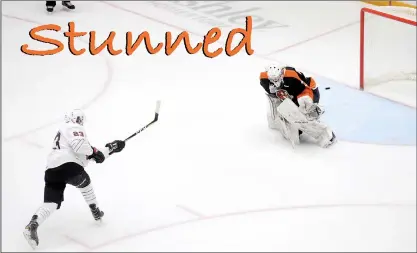  ?? NEWS PHOTO RYAN McCRACKEN ?? Moose Jaw Warriors forward Tristin Langan beats Medicine Hat Tigers goaltender Mads Søgaard in the third round of the shootout to win Saturday’s Western Hockey League game at the Canalta Centre, 4-3.