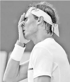  ??  ?? Spain’s Rafael Nadal reacts after losing a point againstAus­tria’s DominicThi­em during their semi-final tennis match at the ATP Argentina Open in Buenos Aires,Argentina, on February 13, 2016.Thiem won 6-4,4-6, 7-6 (6-4). - AFP photo