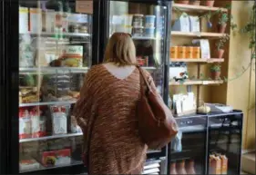  ??  ?? Tammy Stamm, of Reading, shops at the all-vegan grocery store, the Firefly Café Outpost, located in Boyertown. Stamm enjoys being able to eat at the café restaurant then shopping at the outpost which is located right next door.