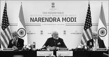  ??  ?? Ahead of the Howdy, Modi event, PM Narendra Modi met top energy sector CEOs at a roundtable meeting on Saturday.
(Photo: Hindustan Times)