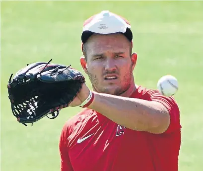  ?? ASHLEY LANDIS THE ASSOCIATED PRESS ?? Los Angeles Angels outfielder Mike Trout is worried about passing COVID-19 to his pregnant wife.