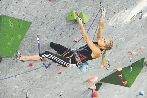  ?? Jeremy Papasso, Daily Camera file ?? Team USA’s Sasha Digiulian climbs during an Internatio­nal Federation of Sport Climbing (IFSC) Lead World Cup competitio­n in 2011 in Boulder.