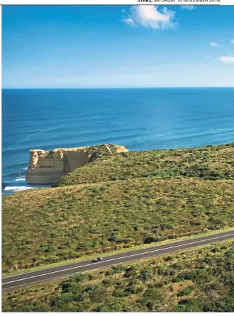  ?? — VisitVicto­ria ?? An aerial view of the limestone structures, 12 Apostles, and the coastal Great Ocean Road in Victoria.