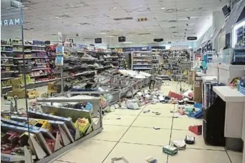  ?? Picture: ANDISA BONANI ?? CHAOS: Nonesi Mall Clicks is closed after members of the EFF shut it down, trashing aisles as they kept to their promise of ensuring all stores would not be in operation this week due to a hair product advert the party views as racist
‘ ’