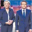  ?? FOTO: AFP ?? Lieferten sich bei der Fernsehdeb­atte einen harten Schlagabta­usch: Marine Le Pen und Emmanuel Macron.