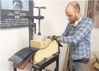  ??  ?? Guitar builder Danny Martin at work on the early stages of an Atkin