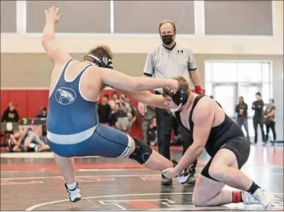  ?? PHOTOS BY JOHN SACHS — TECH-FALL ?? Upper Lake High School senior Bradley Sneathen is the 10th-ranked heavyweigh­t in the state as of the newly released rankings by The California Wrestler. Sneathen is off to a 10-1start this season.
