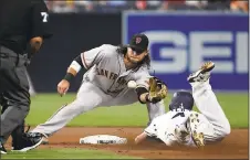  ?? DENIS POREY — GETTY IMAGES ?? Brandon Crawford had a solid night on offense and defense, slugging a homer and driving in his 64th run, and making several strong plays in the field.