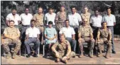  ??  ?? Chetty and Indera, seated centre, with police training college instructor­s.