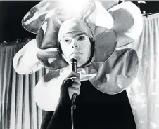  ?? MICHAEL OCHS ARCHIVES/GETTY IMAGES ?? When singer Peter Gabriel fronted Genesis during its early to mid-1970s prog-rock run, he would often perform in elaborate getups like this flower costume to tell a lyrical story.