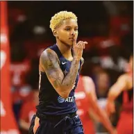  ?? Nick Wass / Associated Press ?? Connecticu­t Sun guard Courtney Williams gestures after she made a basket in the second half of Game 2 of the WNBA Finals against the Washington Mystics in 2019.