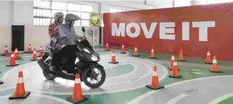  ?? ?? MOVE IT rider-partners undergo rigorous skills assessment exercises as part of the preonboard­ing process. Rider-partners who qualify are invited for annual skills refresh and assessment sessions as part of MOVE IT’s enduring commitment to safety.