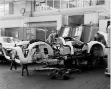  ??  ?? Above right: Constructi­on of one of the first 25 cars underway at Work 1, home of the legendary Test and Racing Department