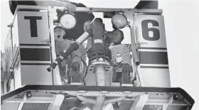 ?? KEN KOONS/BALTIMORE SUN MEDIA GROUP ?? Alijah Wright, 4, right, of Severn, and Conlan Bosley, 4, of Baltimore, ride on a firetruck during the Casey Cares Firefighte­r for a day program at the New Windsor Fire Company.