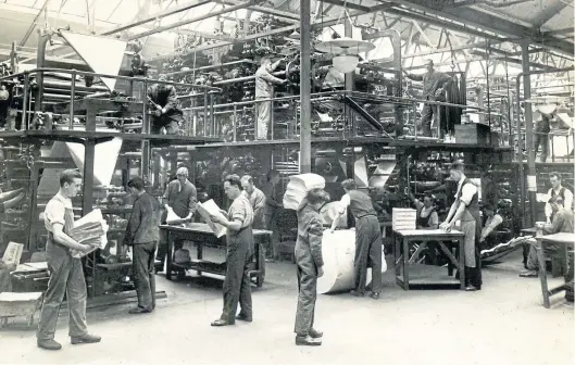  ?? ?? Print workers in the Glasgow pressroom, showing the mighty rotary presses which turned out millions of DC Thomson publicatio­ns.