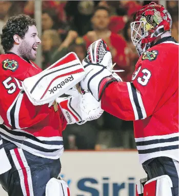  ?? JONATHAN DANIEL/GETTY IMAGES FILES ?? The Carolina Hurricanes picked up Chicago Blackhawks backup Scott Darling, right, and signed him to a four-year deal worth US$4.15 million per season, while the Dallas Stars picked up former Vezina candidate Ben Bishop, taking two likely targets of the...