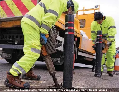  ?? ?? Newcastle City Council staff removing bollards in the Jesmond Low Traffic Neighbourh­ood