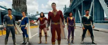  ?? Warner Bros. Pictures ?? Adopted siblings share the power to turn from kids to adult superheroe­s in “Shazam: Fury of the Gods.”