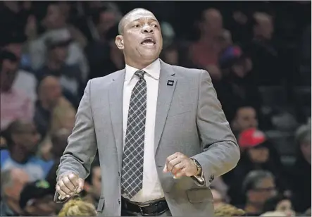  ?? Harry How Getty Images ?? DOC RIVERS is transition­ing into his role as “Papa Doc”: He visited new granddaugh­ter, Carter, this week on a trip to Portland.