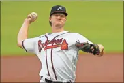  ?? AP-John amis, File ?? Atlanta Braves’ Mike Soroka throws a pitch during the second inning of the baseball team’s home-opener, against the Tampa Bay Rays in Atlanta.