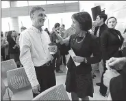  ?? AP/The Herald-Sun/CHRISTINE T. NGUYEN ?? Nobel winner Aziz Sancar, a biochemist at the University of North Carolina, talks with university Chancellor Carol Folt on Wednesday in Chapel Hill. The award was “quite a surprise,” he said.