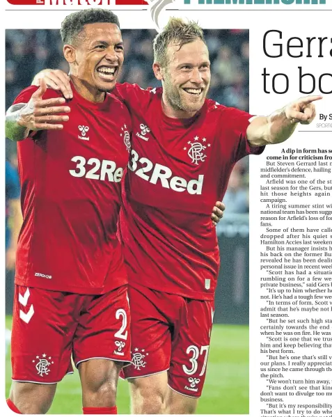  ??  ?? Scott Arfield celebrates good times with skipper James Tavernier