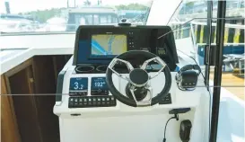  ??  ?? TALL DASH Shorter skippers may struggle to see over the tall upper dashboard ERGONOMICS The throttles are mounted closely to the adjustable steering wheel