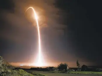  ?? MICHAEL PETERSON AP ?? The SpaceX Falcon 9 rocket launches with the Double Asteroid Redirectio­n Test, or DART, spacecraft onboard Tuesday from Space Launch Complex 4E at Vandenberg Space Force Base in California.