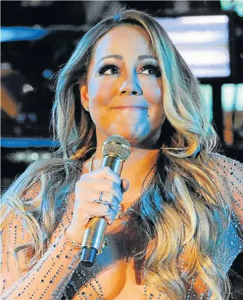  ?? Picture: REUTERS ?? UNHAPPY DIVA: Mariah Carey tries to perform during a concert on New Year’s Eve in New York