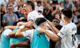  ?? Photograph: José Miguel Fernández/NurPhoto/Shuttersto­ck ?? Javi Guerra, 20, celebrates atop his fellow Valencia young bloods as Atlético are vanquished.