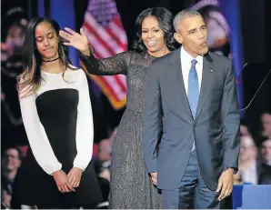  ?? Picture: AFP ?? END OF ERA: US first lady Michelle Obama and US President Barack Obama greet supporters as daughter Malia looks on after the president delivered his farewell address in Chicago