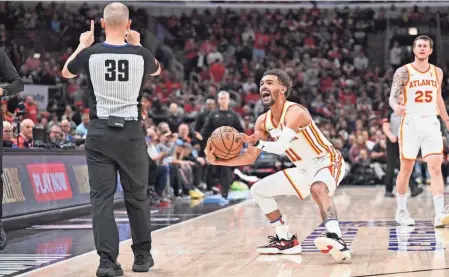  ?? JAMIE SABAU/GETTY IMAGES ?? Trae Young and the Atlanta Hawks saw their season end Wednesday with a loss to the Chicago Bulls in the play-in tournament.