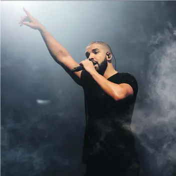  ?? JONATHAN SHORT/THE ASSOCIATED PRESS ?? Canadian musician Drake teased his new album on Instagram with a photo of former NHL enforcer Tie Domi. Could a duet be in the works?