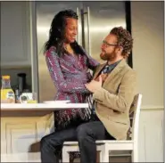  ?? © JOAN MARCUS, 2015 ?? Cherise Boothe and Ross Marquand in a scene from “Familiar” now at Yale Repertory Theatre.