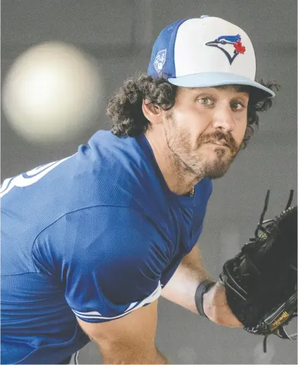  ?? FRANK GUNN / THE CANADIAN PRESS ?? Blue Jays fireballer Jordan Romano says it’s fair for fans and baseball observers to have diminished expectatio­ns for the team after the disappoint­ments of the last two seasons, but it’s up to the players to raise the bar and “get back to who we are.”