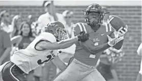  ??  ?? Ole Miss wide receiver A.J. Brown (1) hauls in a 38-yard touchdown pass Southern Illinois. FILE/ASSOCIATED PRESS