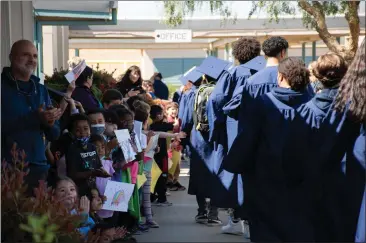  ?? PHOTOS BY MOLLY GIBBS — MONTEREY HERALD ?? More than 700seniors will graduate from schools within the Monterey Peninsula Unified School District Friday at the county’s fairground­s.