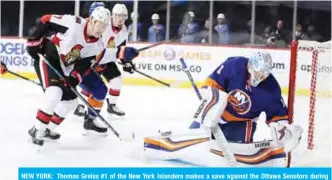  ?? — AFP ?? NEW YORK: Thomas Greiss #1 of the New York Islanders makes a save against the Ottawa Senators during their game at Barclays Center in New York City.