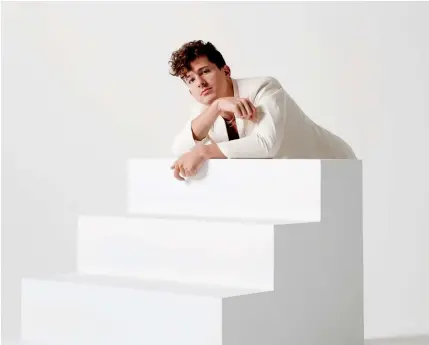  ?? ?? Things you didn’t know about Charlie Puth
Age: 30
--Hometown: Rumson, N.J.
--Well schooled: Attended Berklee College of Music on a full scholarshi­p; graduated in 2013 with a degree in music production and engineerin­g --Man at work: For the “Light Switch” video, he was aiming to show off his behind-thescenes process; “Nobody ever gets to see that. So I just kept the camera rolling.”