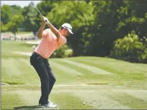  ?? The Associated Press ?? 4-SHOT LEAD: Justin Rose tees off on the ninth hole during the third round of the Fort Worth Invitation­al Saturday at Colonial Country Club in Fort Worth, Texas.