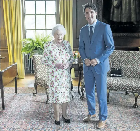  ?? RYAN REMIORZ/THE CANADIAN PRESS ?? Prime Minister Justin Trudeau meets Queen Elizabeth at Holyrood Palace, her at her official residence, in Edinburgh on Wednesday. Trudeau said their meeting was a “warm and engaged” conversati­on.