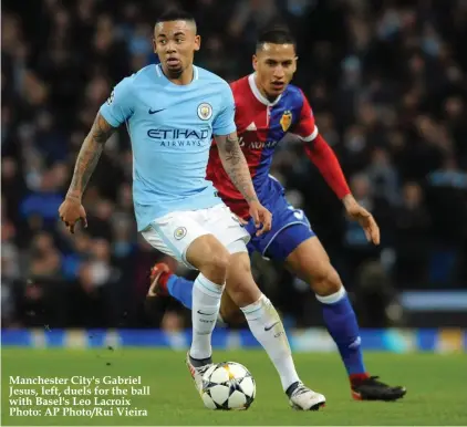  ??  ?? Manchester City's Gabriel Jesus, left, duels for the ball with Basel's Leo Lacroix Photo: AP Photo/Rui Vieira