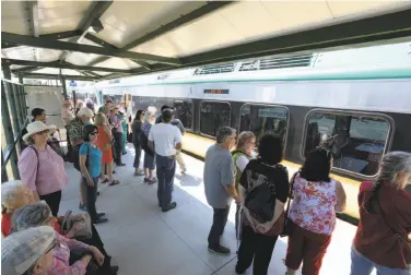  ?? Erik Castro / Special to The Chronicle 2017 ?? SMART trains, which began service last summer, get riders from San Rafael to Petaluma in 31 minutes.