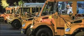  ?? JOHN SPINK/JSPINK@AJC.COM ?? “The sickout” amongst DeKalb bus drivers continued, but with an absence rate of only 6% after Superinten­dent Steve Green fired seven drivers for their roles.