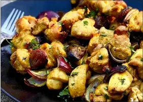  ?? LYNDA BALSLEV — MEDIA NEWS GROUP ?? Marinate the chicken overnight for this easy recipe for Moroccan Chicken Skewers with Apricots and Onion, and the final dish will come together in a flash.