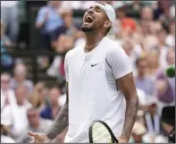  ?? (AP/Alberto Pezzali) ?? Nick Kyrgios celebrates after beating Brandon Nakashima in a Wimbledon men’s singles fourth-round match Monday in London. Kyrgios won 4-6, 6-4, 7-6 (2), 3-6, 6-2 to advance to a Grand Slam quarterfin­al for the first time in 7 1/2 years.