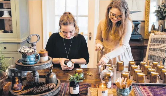  ?? CONTRIBUTE­D PHOTOS ?? Twin sisters Janie, left, and Lauren Noel of Kentville recently launched their own candle business called Noel & Co.