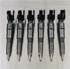  ??  ?? The factory piezo injectors can support a tune-only, 360 rwhp.
Add another CP3 to the equation and they can support as much as 425 rwhp. Then, with a second high-pressure fuel pump in the mix a much larger injector can be utilized. As we go to press, these are the largest injectors built to date for the M57. Built, benched, and balanced by S&S Diesel Motorsport, they are equipped with 100-percent larger nozzles and flow 2,250 cc/min. They are believed to be capable of supporting more than 1,000 rwhp.