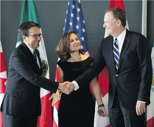  ?? LARS HAGBERG / AFP/ GETTY IMAGES ?? From left, Mexico’s Secretary of Economy Ildefonso Guajardo Villarreal, Canada’s Minister of Foreign Affairs Chrystia Freeland, and U. S. Trade Representa­tive Robert E. Lighthizer at the third round of NAFTA talks in Ottawa.