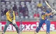  ?? M ZAKIR / HT ?? Dinesh Chandimal is bowled by Aaron Phangiso.